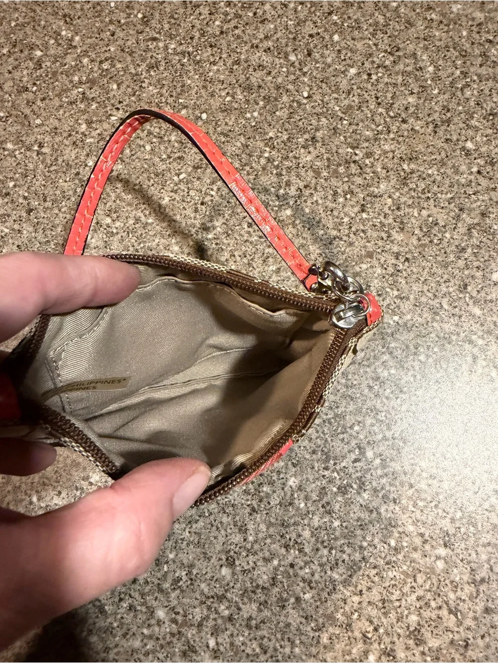 Coach Signature Monogram Wristlet in Brown and Coral